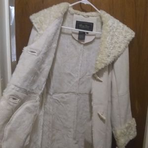 Terry Lewis Classic Luxuries. faux fur long coat.